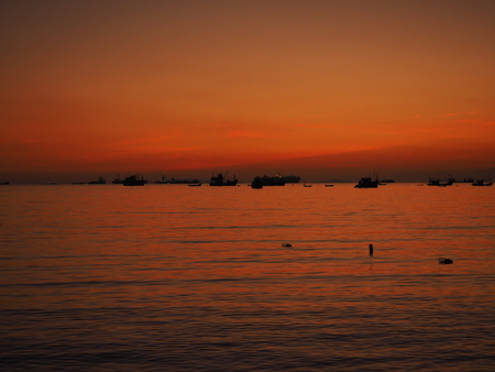 sunset sea boatの写真素材