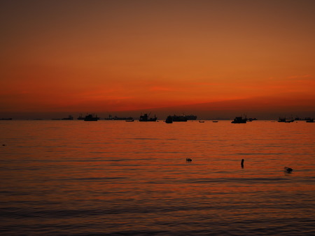 sunset sea boatの写真素材