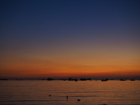 sunset sea boatの写真素材