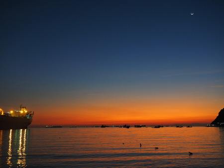 sunset sea boatの写真素材