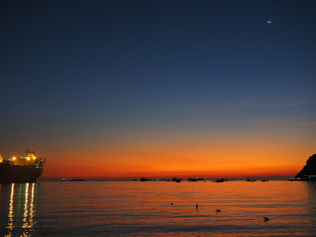 sunset sea boatの写真素材