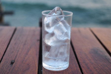 Glass of ice waterの写真素材