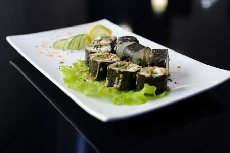 Sushi rolls on white dish. Japanese food.の写真素材
