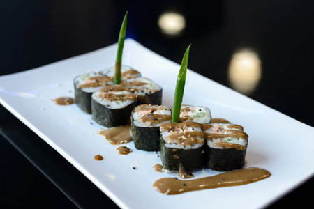 Sushi rolls on white dish. Japanese food.の写真素材