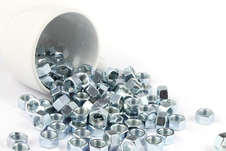 metal nut with cup on white backgroundの写真素材