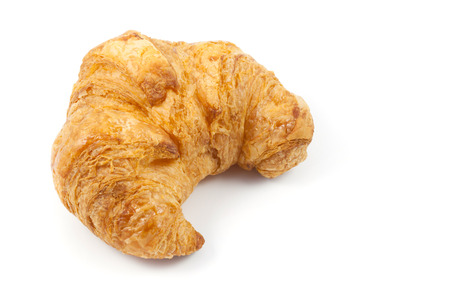 close up  the side of  croissant on white backgroundの写真素材