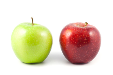 green and red apple on white backgroundの写真素材