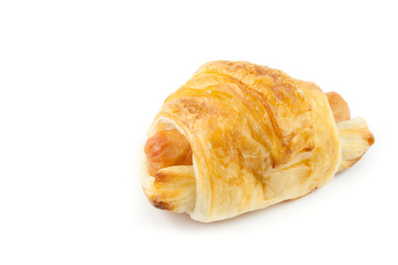 close up  croissant with hot dog on white backgroundの写真素材