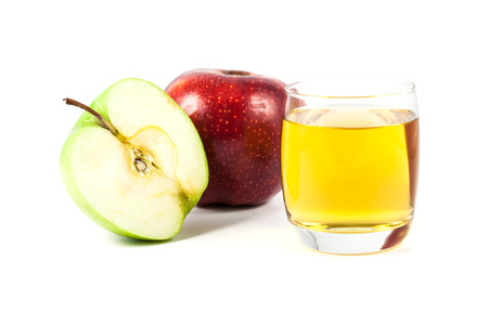 close up apple and juice on white backgroundの写真素材