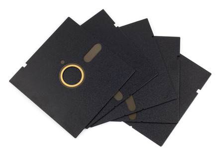 close up five inch diskette on white background