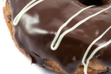 close up brown donut on white backgroundの写真素材