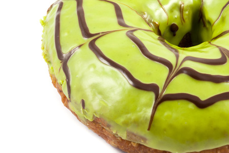 close up green tea donut on white backgroundの写真素材