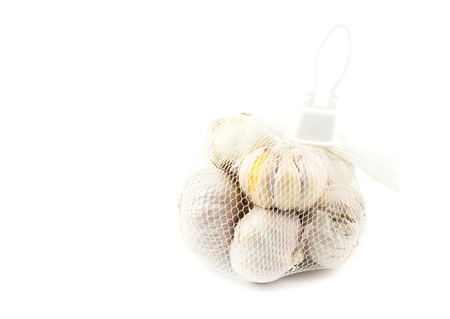 close up white garlic on white backgroundの写真素材