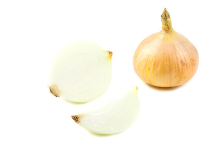close up yellow onions on white backgroundの写真素材