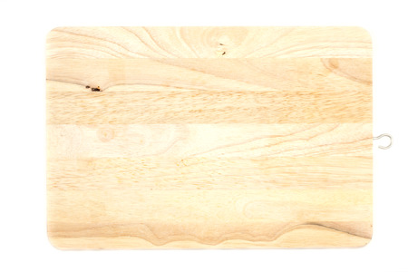 wood chopping board on white backgroundの写真素材