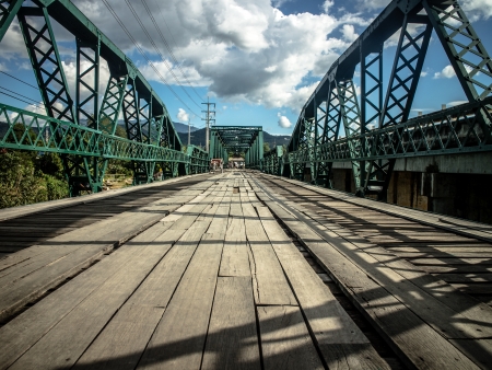 Old bridge over the riverの写真素材