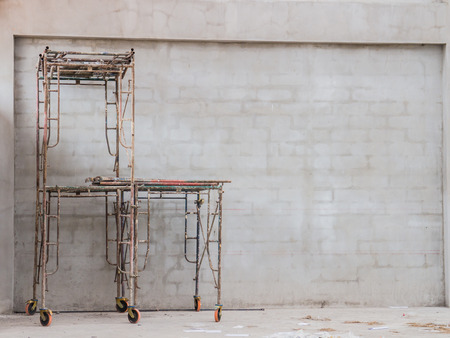Rusty tubular scaffolding at a construction siteのeditorial素材
