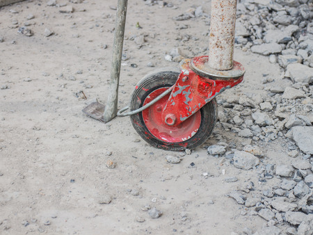 Rusty tubular scaffolding at a construction site