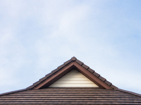 Brand new roof slate roofing against blue skyの写真素材