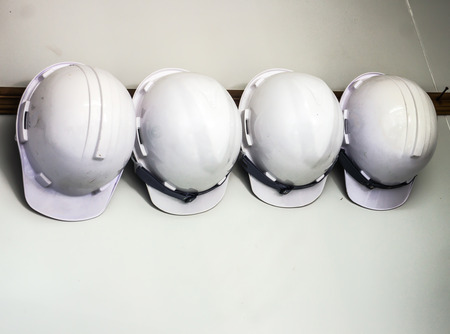 Plastic safety helmet on the cover flap