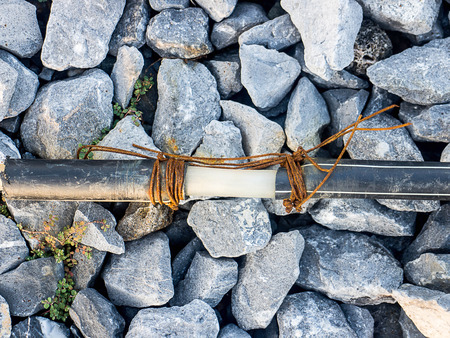 Coiled black Hose in the Park, Connected to black Hoseの写真素材