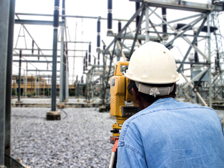 Surveyor engineer on the substationの写真素材