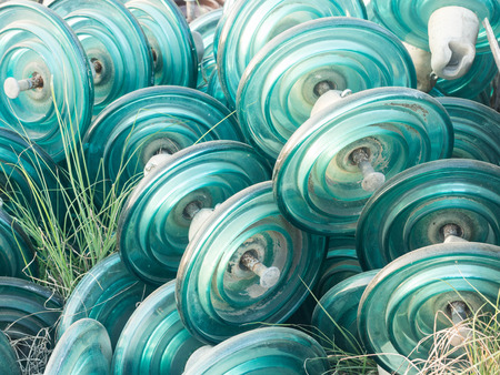 old Texture of high-voltage insulators. Located on the wall energyの写真素材