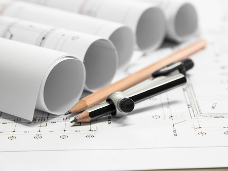 Architectural blueprint of office building with a pencils