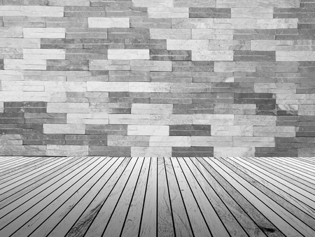 perspective wood plank floor with over blur Brick wall backgroundの写真素材