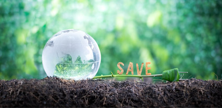 Energy from nature, friendly to the environment and the world for renewable, sustainable development, green energy and alternative fuel ,environment and Ecology concept.Save energy, save the worldの写真素材