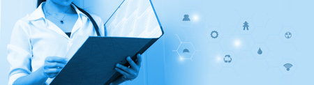 Medicine doctor working with modern computer interface as medical network concept.の写真素材