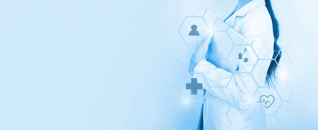 woman young  doctor hand holding blur tablet shows a list of patients and icon medical network connection on virtual screen interface.Vaccination concept. laboratory, medical and healthcareの写真素材