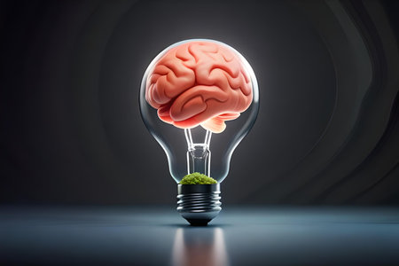 Lightbulb with human brain inside on dark background. 3D renderingの素材