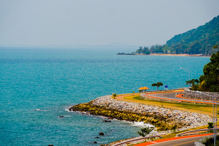 Curvy seaside road - chaloem burapha chonlathit road with sunset at Chanthaburi Thailandの写真素材