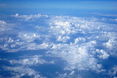 Aerial photos Shows lots of clouds like the sea. And the atmosphere of the airport. Including downtown Chiang Mai.の写真素材