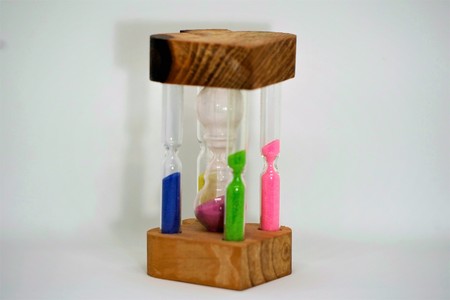 An hourglass (or sandglass, sand timer, sand watch, or sand clock) is a device used to measure the...