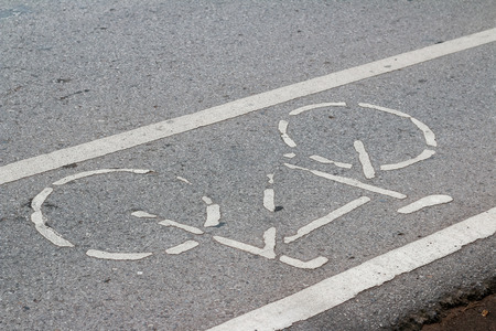 Bike lane asphalt texture , soft focus ,blurred lightsの写真素材