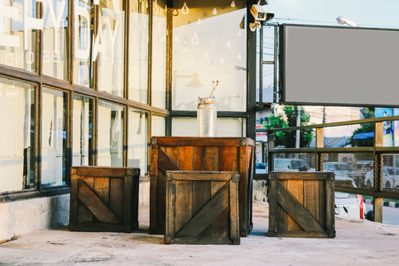 A wooden box used as chairs and a table in the coffee shop.の写真素材