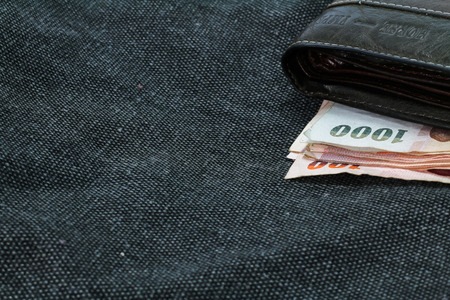 wallet with money on bagsの写真素材