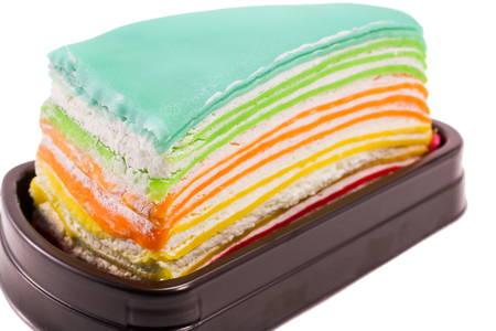 Rainbow crape cake isolated on white background (Selective Focus)の写真素材