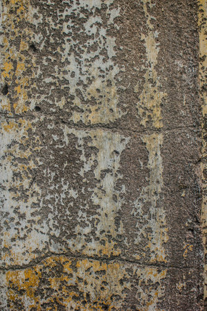 Old cement wall partially damaged, Old cement wall texture. Old cement wall one hundred and thirty...