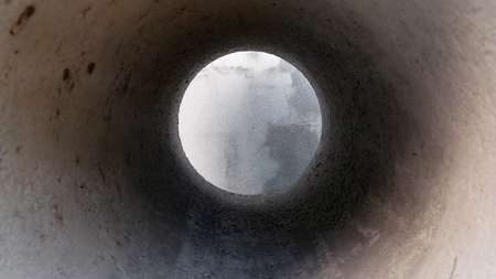 Inside the cement pond. Hole of cement pond.の写真素材