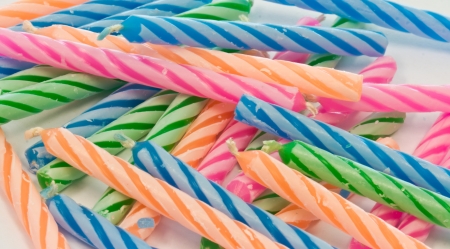 A bunch of colorful Birthday Candles の写真素材