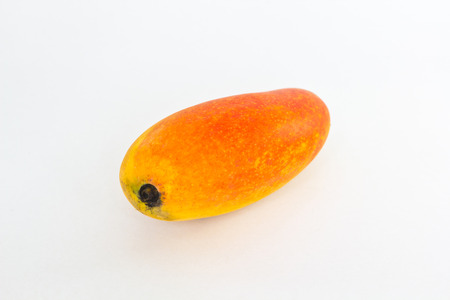 Ripe mango on white  の写真素材