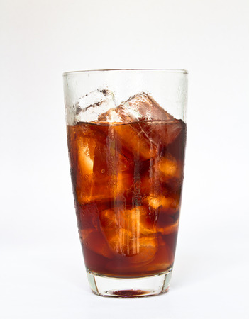 glass of cola white backgroundの写真素材