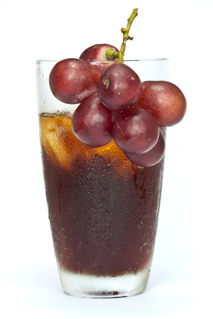 soft drink with fresh grapes on white background  の写真素材