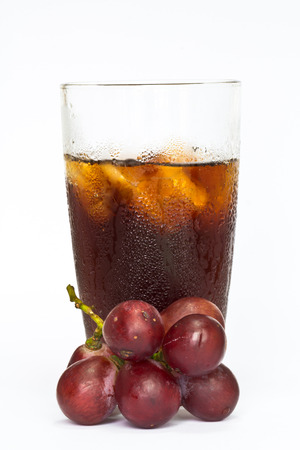 soft drink with fresh grapes on white background  の写真素材
