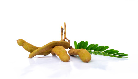 Fresh sweet tamarind isolated on white background ,with leavesの写真素材