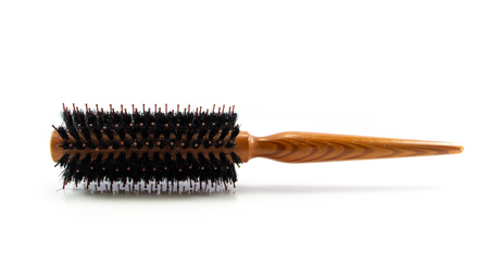 Wooden hairbrushes isolated on white backgroundの写真素材