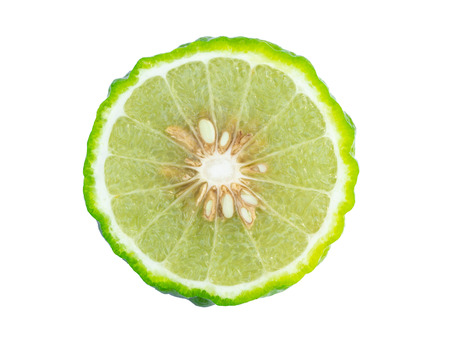 Closeup bergamot fruit with leaf isolated on white background.